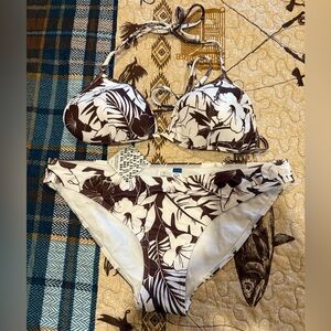 Roidal brand bikini swimsuit featuring a brown and white floral print NWT